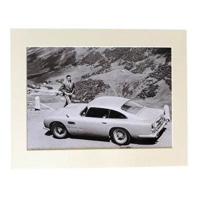Bond returning to his DB5 Aston A4 Mounted Photo