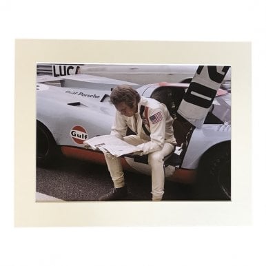 Reading Newspaper at Le Mans A4 Mounted Photo